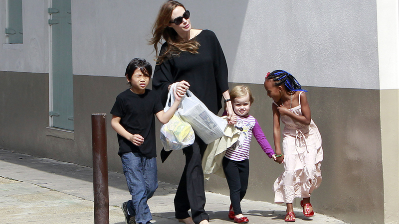 Illustration for article titled Pax Jolie-Pitt Has Attitude; Zahara Jolie-Pitt Has Blue Extensions